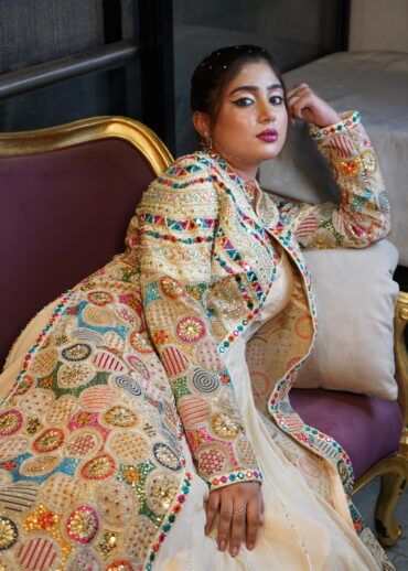 IVORY GOWN WITH GOLDEN JACKET