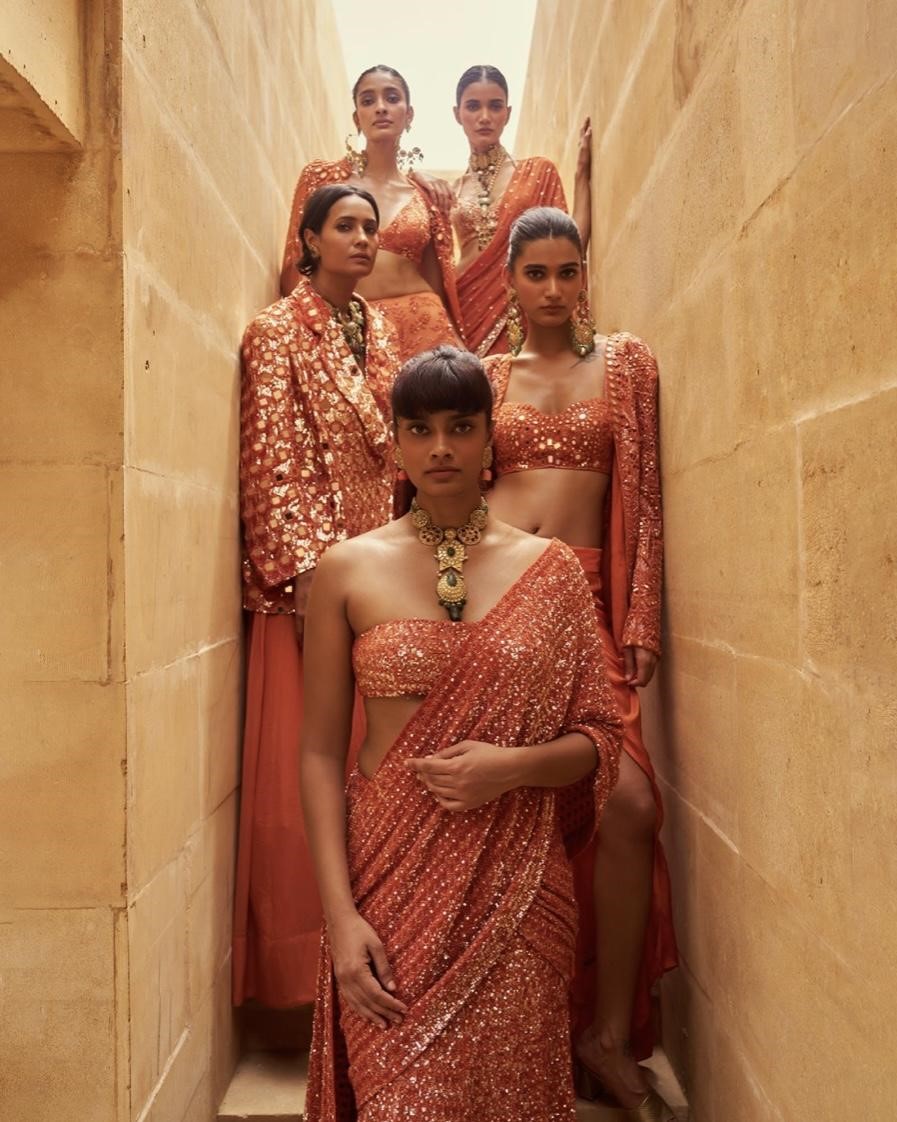 Make this orange color the theme of your wedding function to stay ahead of the hottest trend just like the Ambanis.