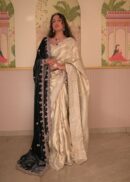 Tissue silk banarasi saree in silver beige color with silver zardozi embroidered border