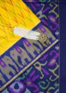 Soft silk patola, yellow saree with purple border and blouse