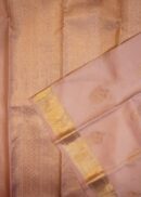 Kanjivaram saree in lavender pink. Zari butta, zari border and zari pallu.