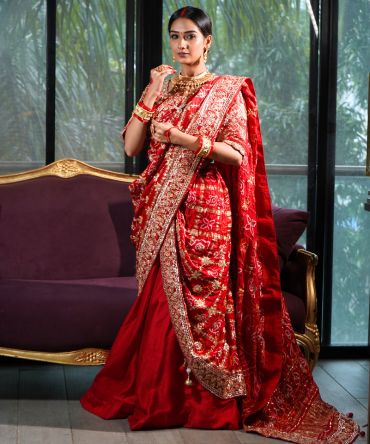 Gharchola red bandhani saree with zardozi and gota patti work